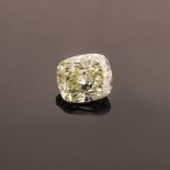 A FANCY GREEN-YELLOW DIAMOND the 1.27ct modified brilliant cushion cut, clarity SI2 is accompanied