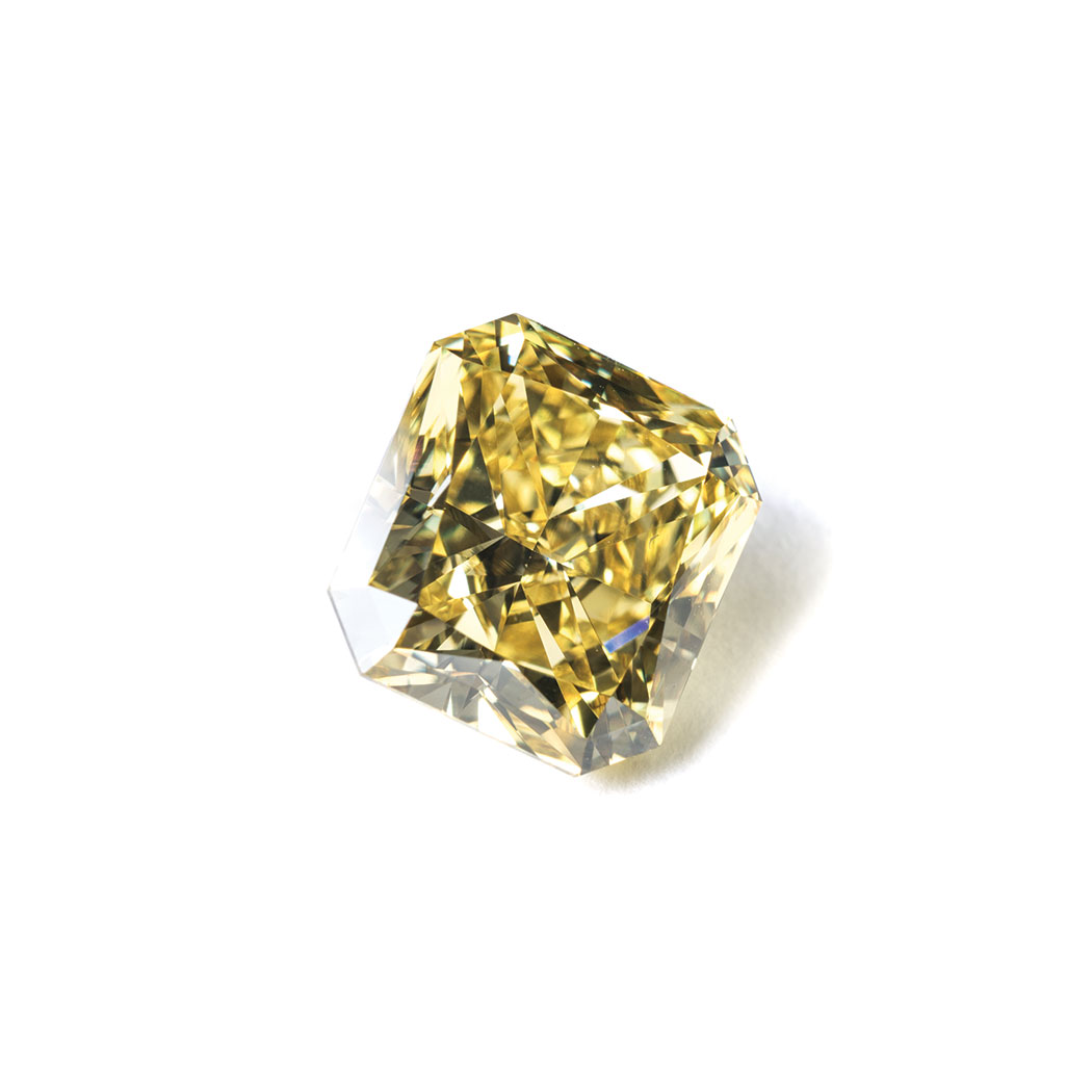 A FANCY VIVID YELLOW DIAMOND the 3.54ct modified brilliant cut-cornered rectangular cut, clarity VS1