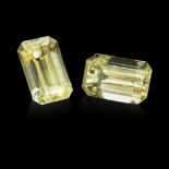 A 12.52CT PAIR OF YELLOW SAPPHIRES (2) the pair of step emerald cut light golden yellow sapphires is