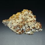 OLMIITE CRYSTALS ON DRUZY CALCITE A large cabinet sized specimen of a mineral that is still only