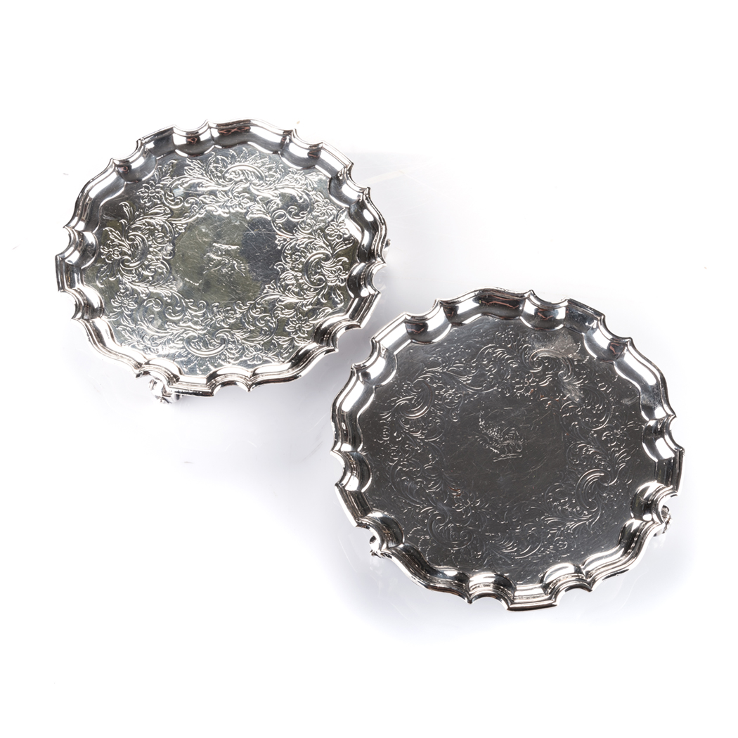 A PAIR OF OLD SHEFFIELD PLATE SALVERS, EARLY 19TH CENTURY shaped circular with pie-crust rim, the