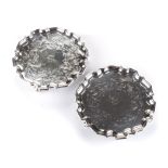 A PAIR OF OLD SHEFFIELD PLATE SALVERS, EARLY 19TH CENTURY shaped circular with pie-crust rim, the