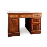 A MAHOGANY PARTNERS DESK, 19TH CENTURY the rectangular top with a gilt-tooled leather inset