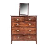 A GEORGE III MAHOGANY CHEST OF DRAWERS the rectangular top with a concealed mirror above a pair of