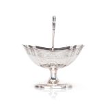 A GEORGE III IRISH SILVER SWING-HANDLED SUGAR BASKET, WILLIAM DOYLE, DUBLIN, 1798 the fluted oval