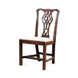 A WALNUT 'CHIPPENDALE STYLE' SIDE CHAIR, 19TH CENTURY the curved top rail above a carved and pierced