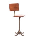 A VICTORIAN MAHOGANY, CAST IRON AND BRASS MUSIC STAND, MANUFACTURED BY LEVESON & SONS, CIRCA 1880