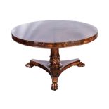 A WILLIAM IV ROSEWOOD TABLE the circular top above a plain frieze on a tapering column, carved