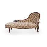 A VICTORIAN MAHOGANY AND UPHOLSTERED CHAISE LONGUE the pierced shaped and curved back surmounted