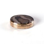 AN AGATE SNUFF BOX oval, the hinged lid enclosing a compartment, the front and sides showing the
