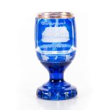 A BOHEMIAN GLASS, 20TH CENTURY blue with gilt rim and highlights, the body engraved with frosted