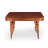 A VICTORIAN MAHOGANY EXTENDING DINING TABLE