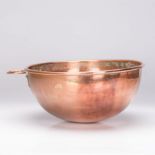 A CAPE COPPER MIXING BOWL, 19TH CENTURY the hemispherical shaped bowl with a rolled rim, applied