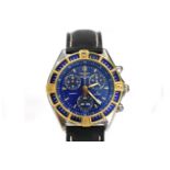 A GENTLEMANS STAINLESS STEEL AND GOLD WRISTWATCH, BREITLING J CLASS quartz, the circular blue dial