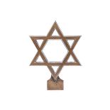 A BRASS CEMETERY STAR OF DAVID, EARLY 20TH CENTURY of typical form, 21,5cm high PROVENANCEGIFT TO