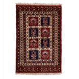 A MESHED RUG, PERSIA condition: good 124cm by 83cm