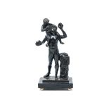 A PATINATED BRONZE OF A MAN WITH CHILD a nude male figure being fed grapes by a child seated on