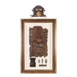 A DUTCH 18TH CENTURY FRAMED PORTION OF AN ARON HAKODESH comprising: a part of the leather interior
