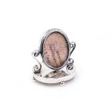 A GEORGE V SILVER MINIATURE DRESSING TABLE MIRROR, E.J. HOULSTON, BIRMINGHAM, 1911 the oval base