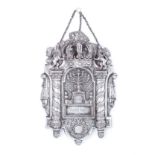A 19TH CENTURY COPY OF AN 18TH CENTURY GERMAN SILVER TORAH SHIELD of cartouche form, chased and