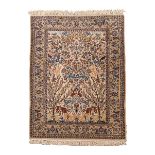 AN ISFAHAN RUG condition: fair 173cm by 110cm