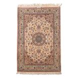 AN ISFAHAN RUG condition: fair 227cm by 151cm