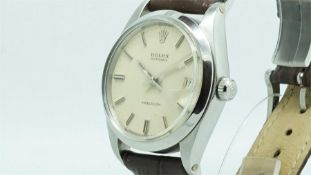 Gentlemen's Rolex Precision Oysterdate Wristwatch, circular cream dial with two tone baton hour