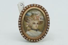 Victorian miniature painted portrait pendant/brooch, hand painted portrait on ivory, within a seed