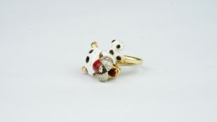 A French ruby, diamond and enamel panther ring, with ruby eyes and diamond detail to the face, and