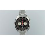 GENTLEMEN'S HEUER AUTAVIA STAINLESS STEEL CHRONOGRAPH REF. 11630, circular black dial with twin