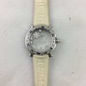 Chopard Happy Sport Snow Flake, circular white dial with snow flake design, luminous hour markers