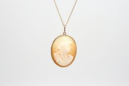 Victorian cameo pendant, in a yellow metal plain frame tested as 9ct, on a yellow metal chain