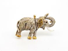 Enamel elephant brooch, grey enamel with detail, stone set ears, ruby set eye, white enamel tusk, in