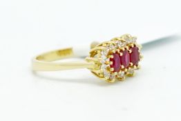 Synthetic ruby and cubic zirconia ring set in 18ct gold, finger size L