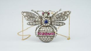 Sapphire, diamond and ruby bee pendant, in silver upon gold, on an integrated 18ct yellow gold