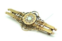 Victorian opal and diamond brooch, central opal set within a floral cluster of old cut diamonds,