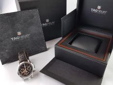 GENTLEMEN'S TAG HEUER CARRERA WRISWTACH, circular black dial triple register chronograph,