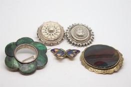 Selection of mainly silver brooches, including a heavy malachite brooch