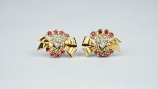 A pair of French ruby and diamond spray ear clips, set with four round cut rubies and old cut and