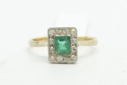 Emerald and diamond ring, central emerald surrounded by Swiss cut diamonds, mounted in yellow metal,