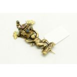 Gem set brooch, depicting a cherub holding a basket of fruit set with a ruby, turquoise and emerald,