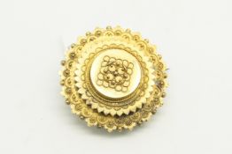 Victorian Etruscan style circular mourning brooch, stamped 15ct