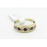 Ruby and diamond half eternity ring, five round cut rubies, spaced by round cut diamonds, mounted in