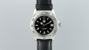 GENTLEMEN'S TAG HEUER PRFESSIONAL REF. WK1110-1, black dial, date aperture, 36mm stainless steel