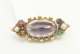 Gem set brooch, central oval cut foil backed stone with beaded surround, pearls and gems set to each