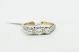 Three stone diamond ring, three round brilliant cut diamonds, weighing an estimated total of 0.55ct,