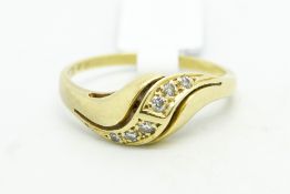 Diamond twist ring, set with round brilliant cut diamonds, mounted in yellow metal stamped 18ct,