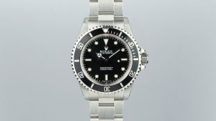 RARE GENTLEMEN'S ROLEX SUBMARINER STAINLESS STEEL w/ BOX & PAPERS 1999 REF. 14060, circular black