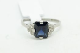 Sapphire and diamond cluster rings, central step cut sapphire, with five single cut diamonds to each