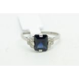 Sapphire and diamond cluster rings, central step cut sapphire, with five single cut diamonds to each